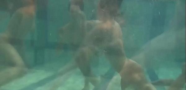  Sexy young teens swirl in the water